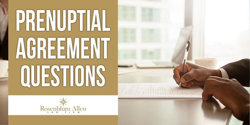 Prenuptial Agreement Questions image showing man signing a document.