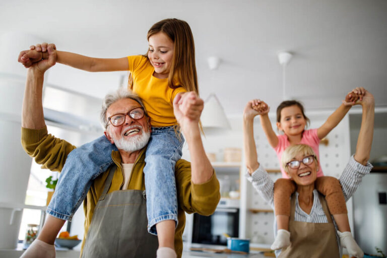 grandparents playing with grandchildren